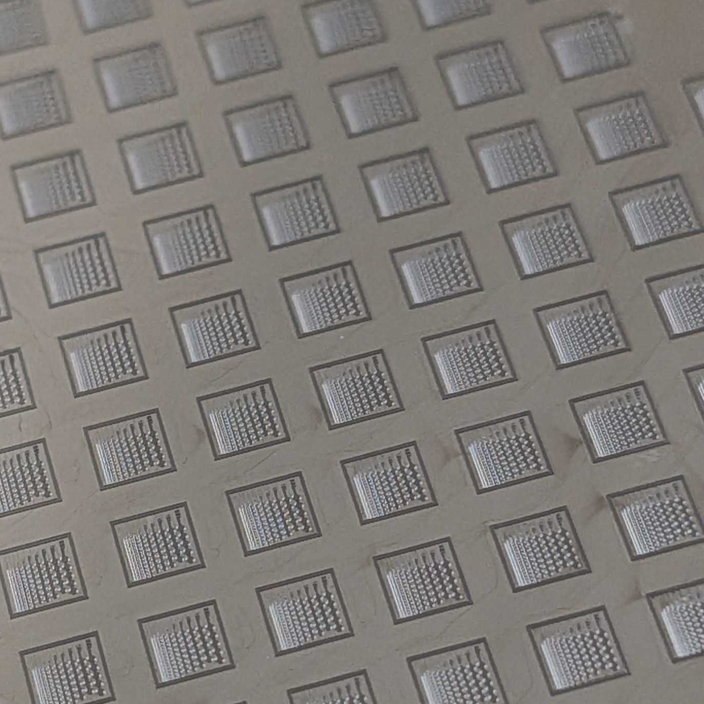 Fabricated microwell molds on silicon wafer